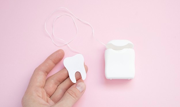 flossing tips by airdrie dentist